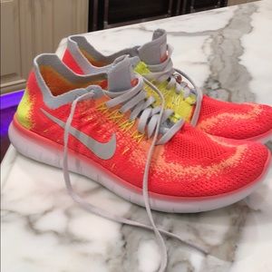 Nike Free RN Flyknit like new! Bright pink/coral